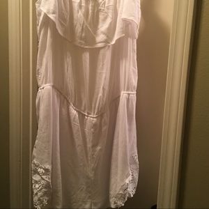 Strapless romper . NEVER WORN